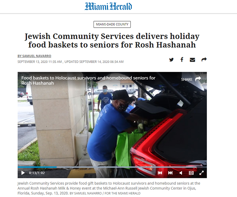 Miami Herald logo, Jewish Community Services delivers holiday food baskets to seniors for Rosh Hashanah article, someone putting bags into a car